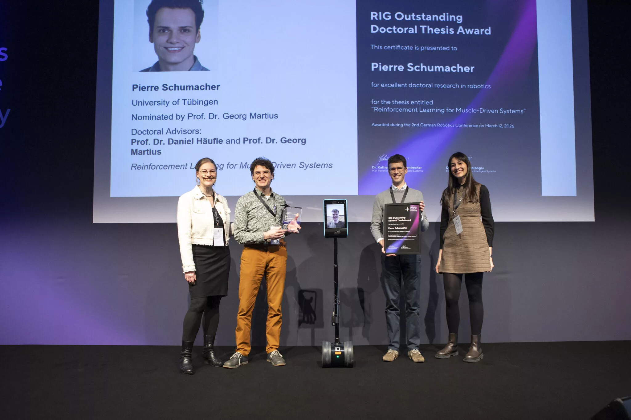 Pierre Schumacher receives RIG “Outstanding Doctoral Thesis Award” at the German Robotics Conference 2026